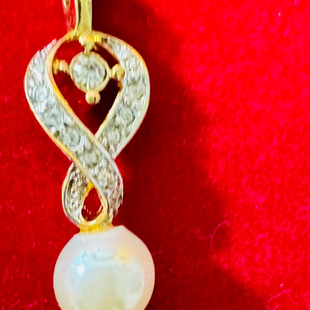 Nina Ricci Gold and Silver Infinity Necklace - Picture 2 of 9